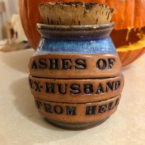Ceramic hand thrown jar. Great conversation piece!